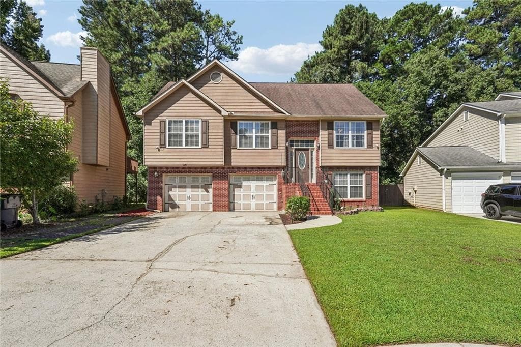 4 bedroom, 3 bathroom, 2,400 sq ft single family residence sold at 1765 Stoneoak Circle, Lawrenceville, GA 30043