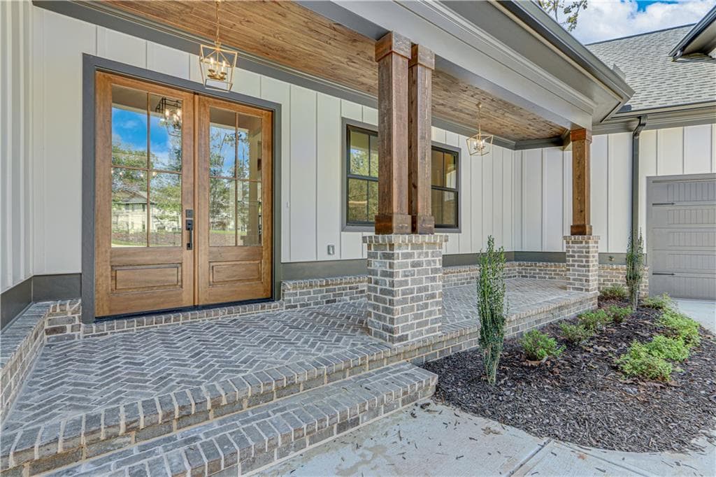 4 bedroom, 5 bathroom, 7,091 sq ft single family residence under contract at 8205 Nicholson Lot #3 Road, Cumming, GA 30028 — photo 5