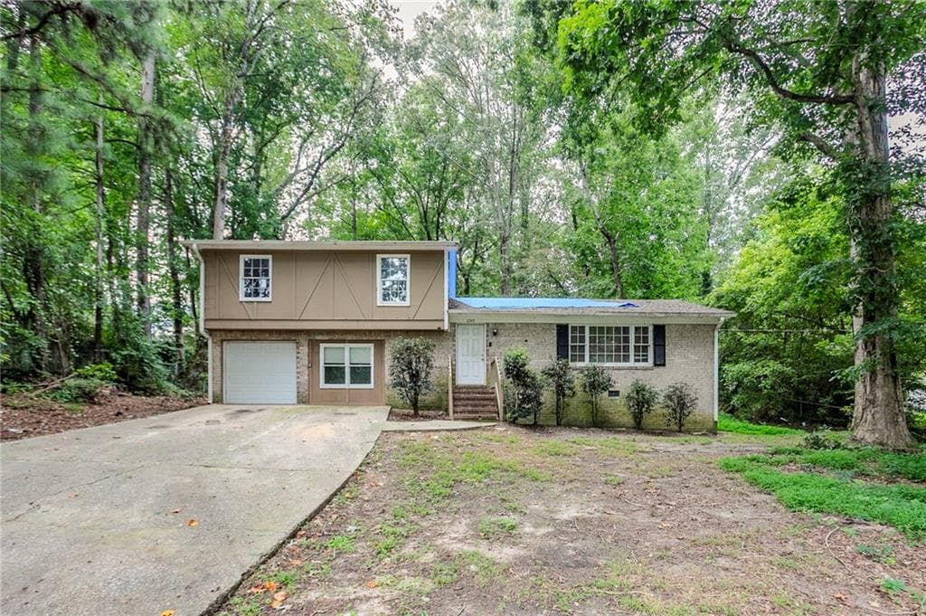 4 bedroom, 3 bathroom, 2,077 sq ft single family residence sold at 2345 Lake Jodeco Road, Jonesboro, GA 30236