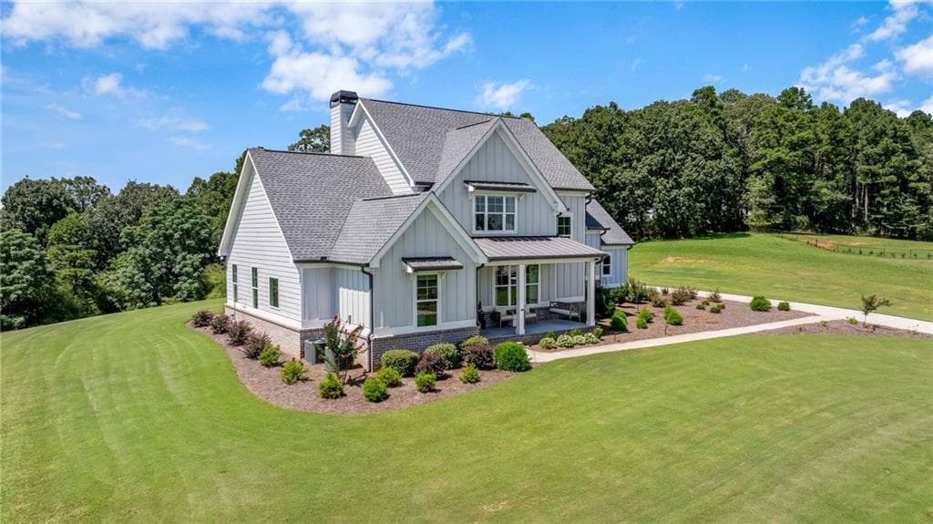 5 bedroom, 6 bathroom, 3,712 sq ft single family residence for sale at 815 N Hampton Way, Monroe, GA 30656 — photo 2