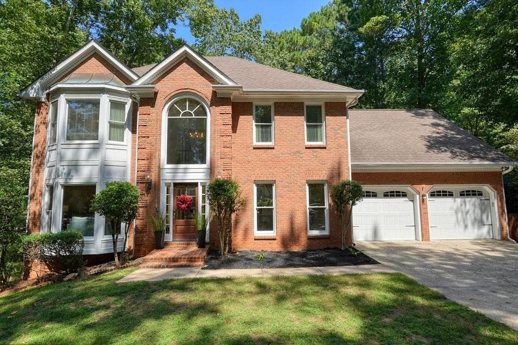 6 bedroom, 4 bathroom, 3,971 sq ft single family residence sold at 409 Woodruff Crossing, Woodstock, GA 30189