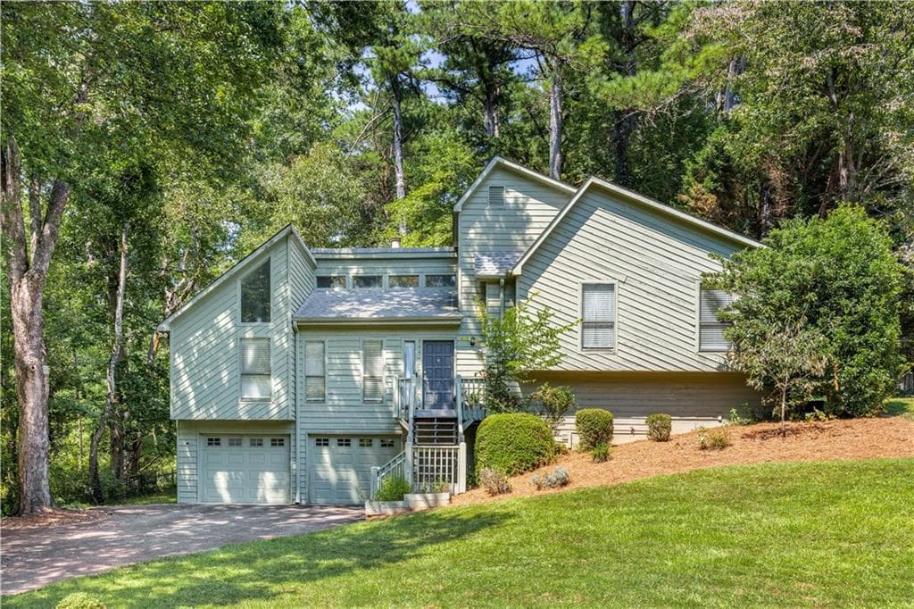 4 bedroom, 3 bathroom, 2,400 sq ft single family residence sold at 1877 Falcon Wood Drive, Marietta, GA 30066