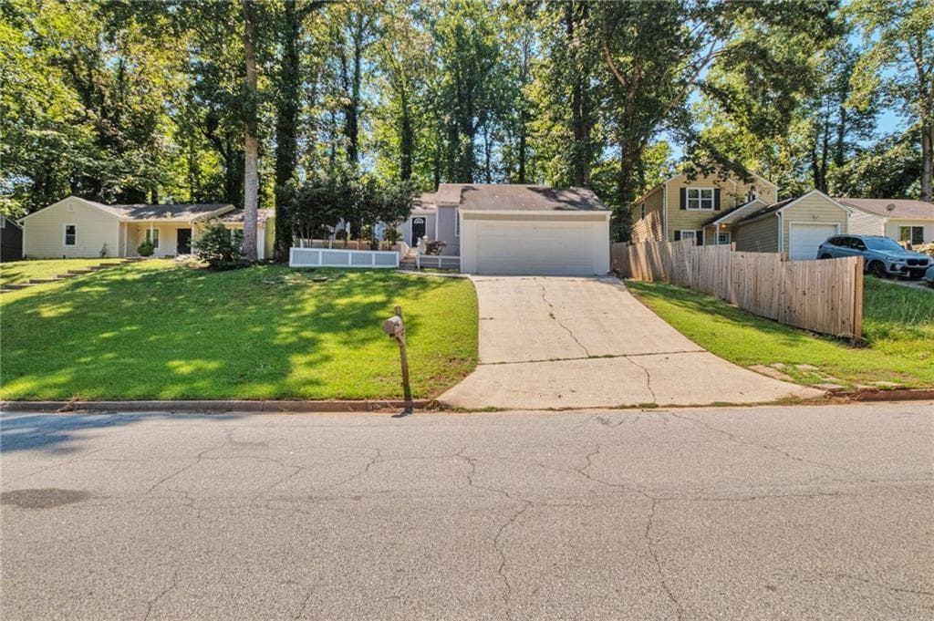 3 bedroom, 2 bathroom, 1,288 sq ft single family residence for sale at 5061 Martins Crossing Road, Stone Mountain, GA 30088