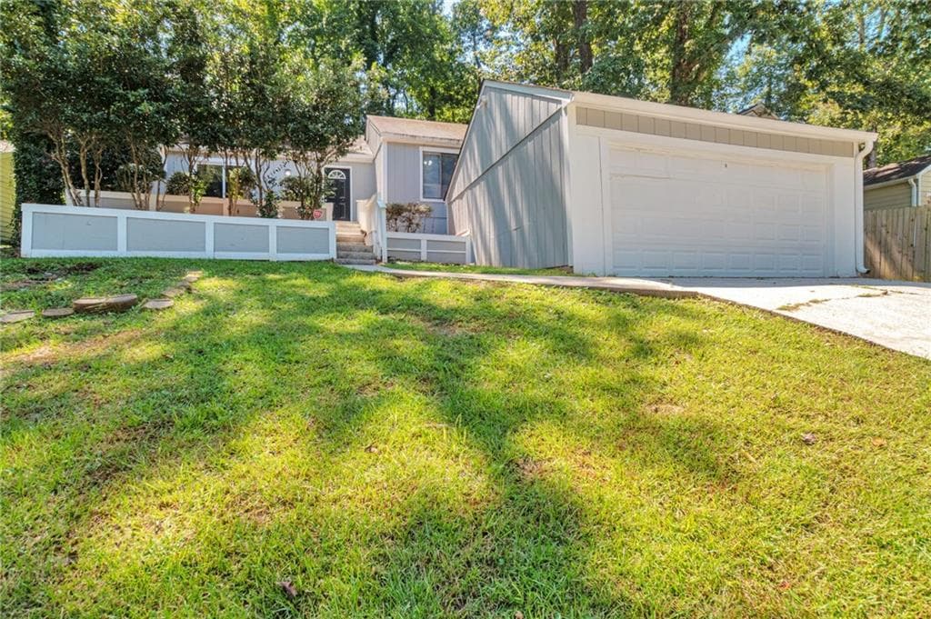 3 bedroom, 2 bathroom, 1,288 sq ft single family residence for sale at 5061 Martins Crossing Road, Stone Mountain, GA 30088 — photo 2
