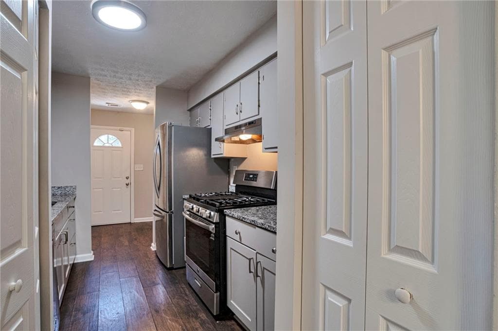 3 bedroom, 2 bathroom, 1,288 sq ft single family residence for sale at 5061 Martins Crossing Road, Stone Mountain, GA 30088 — photo 6