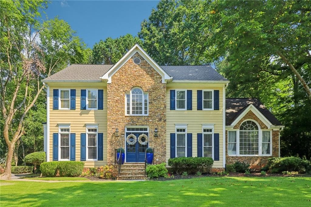 4 bedroom, 5 bathroom, 4,569 sq ft single family residence sold at 2575 Hidden Wood Lane, Lawrenceville, GA 30043