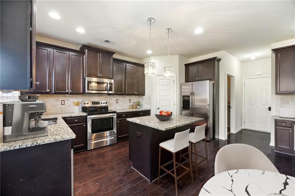 4 bedroom, 4 bathroom, 3,017 sq ft single family residence for sale at 6891 DRESDEN Drive, Rex, GA 30273 — photo 7