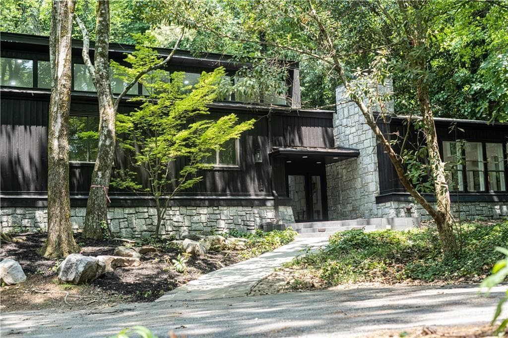 6 bedroom, 4 bathroom, 4,585 sq ft single family residence sold at 4377 Paran Place, Atlanta, GA 30327