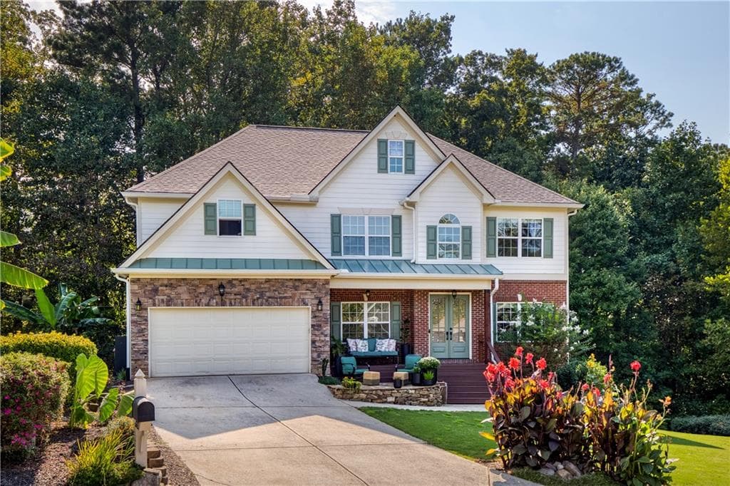 6 bedroom, 4 bathroom, 5,015 sq ft single family residence sold at 6765 Creek View Lane, Cumming, GA 30041
