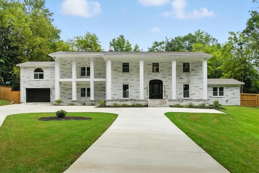 7 bedroom, 7 bathroom, 6,290 sq ft single family residence sold at 4395 Woodland Brook Drive, Atlanta, GA 30339