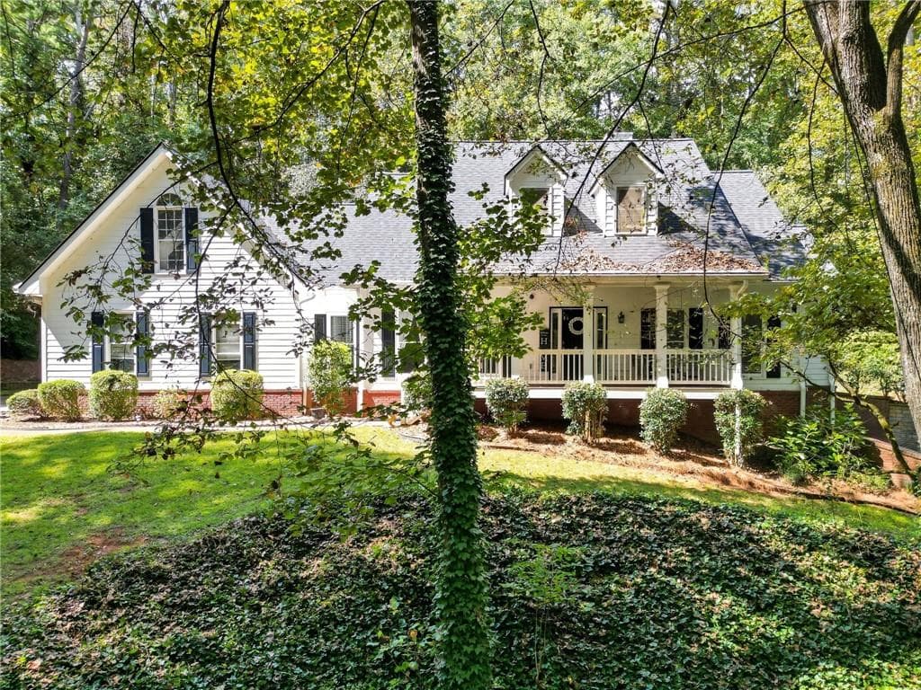 7 bedroom, 4 bathroom, 4,400 sq ft single family residence for sale at 5090 Eubanks Road, Woodstock, GA 30188