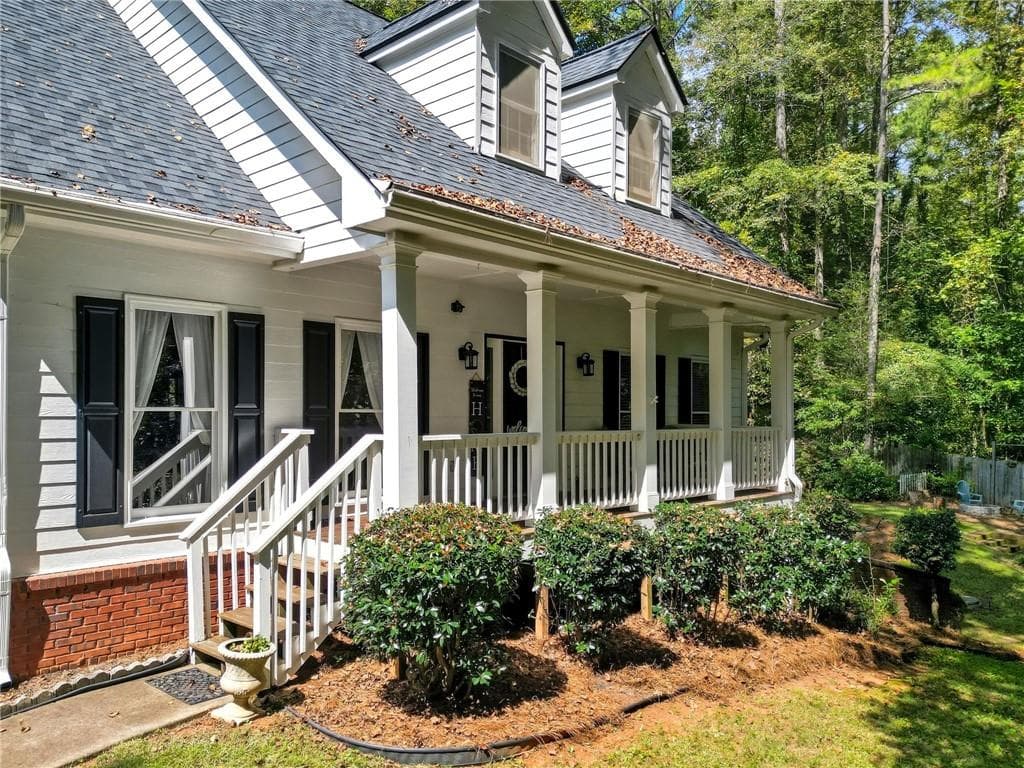 7 bedroom, 4 bathroom, 4,400 sq ft single family residence for sale at 5090 Eubanks Road, Woodstock, GA 30188 — photo 2