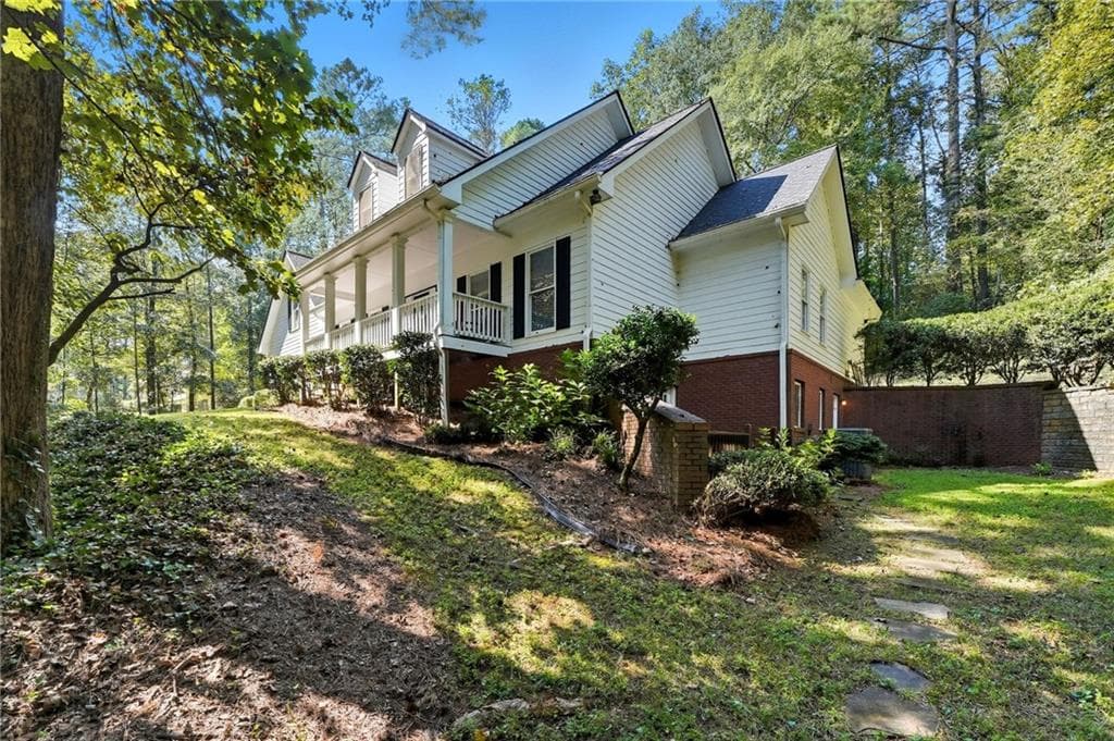 7 bedroom, 4 bathroom, 4,400 sq ft single family residence for sale at 5090 Eubanks Road, Woodstock, GA 30188 — photo 3