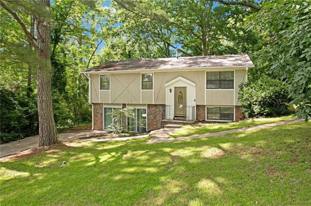 4 bedroom, 3 bathroom, 2,047 sq ft single family residence under contract at 4690 Big Valley Court, Stone Mountain, GA 30083