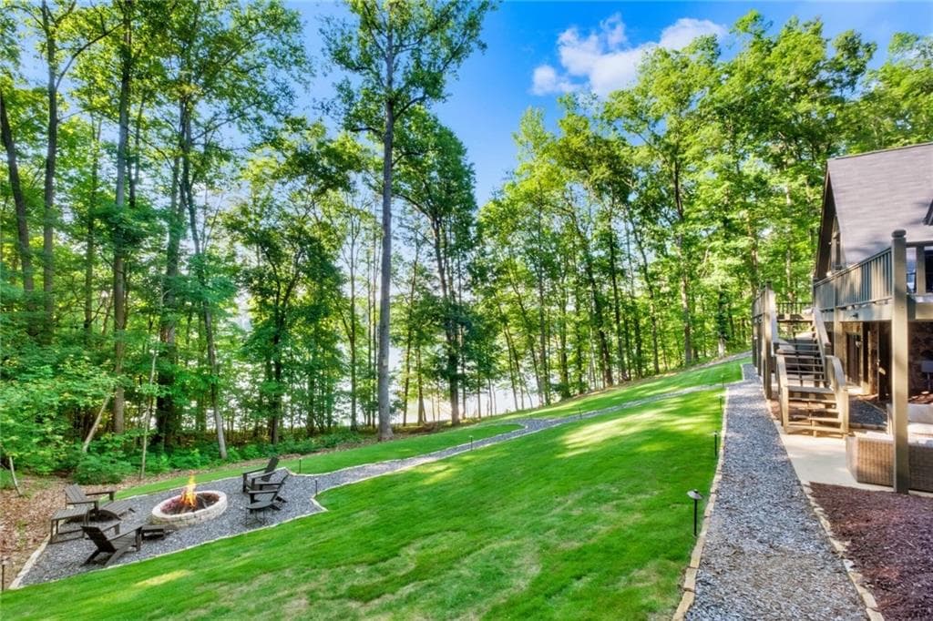 4 bedroom, 3 bathroom, 3,341 sq ft single family residence for sale at 5608 Azelia Drive, Gainesville, GA 30506 — photo 3