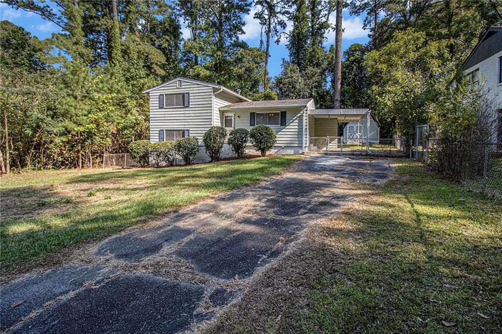 4 bedroom, 2 bathroom, 1,325 sq ft single family residence for sale at 1961 Kenwood Road, Smyrna, GA 30082 — photo 2