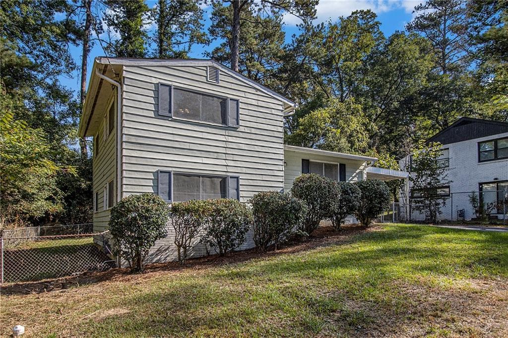4 bedroom, 2 bathroom, 1,325 sq ft single family residence for sale at 1961 Kenwood Road, Smyrna, GA 30082 — photo 3