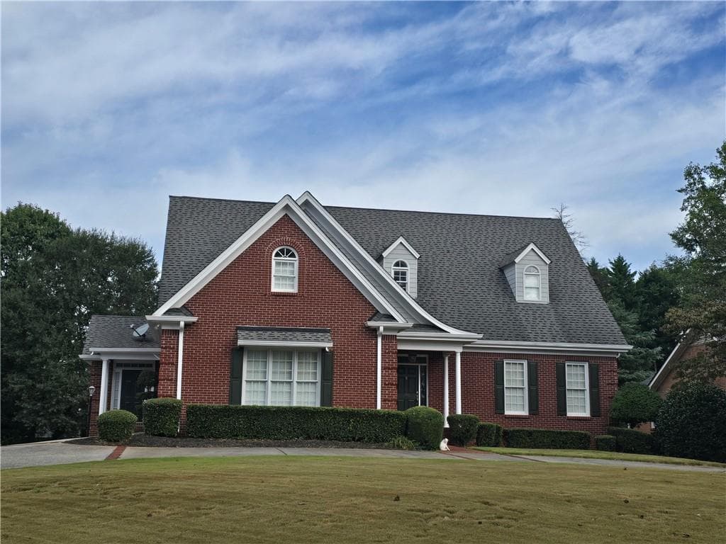 5 bedroom, 6 bathroom, 4,055 sq ft single family residence for sale at 265 Regal Drive, Lawrenceville, GA 30046 — photo 2