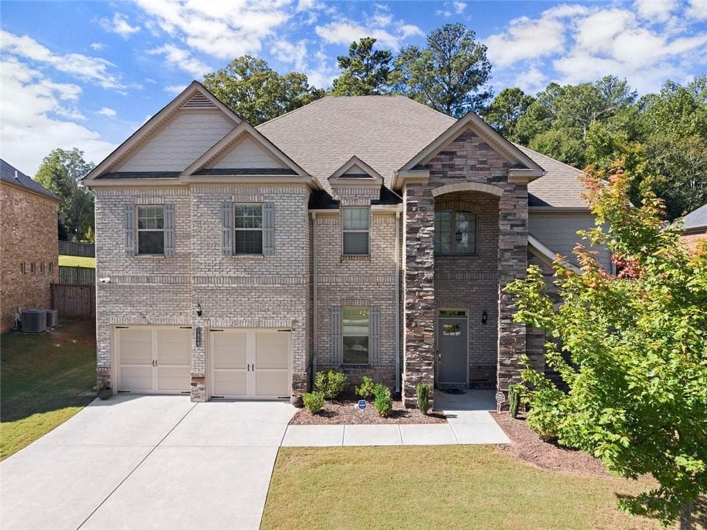 5 bedroom, 4 bathroom, 4,476 sq ft single family residence sold at 4550 Point Rock Drive, Buford, GA 30519