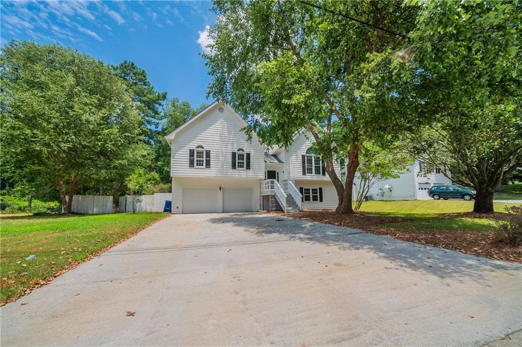 4 bedroom, 3 bathroom, 1,994 sq ft single family residence sold at 1010 Burning Bush Drive, Loganville, GA 30052