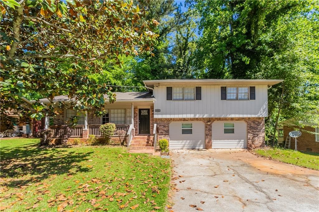 3 bedroom, 2 bathroom, 2,439 sq ft single family residence for sale at 802 San Miguel Drive, Stone Mountain, GA 30083 — photo 1 of 42
