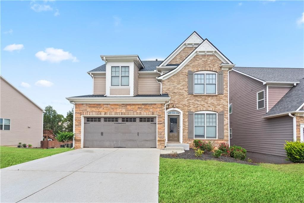 4 bedroom, 3 bathroom, 2,559 sq ft single family residence sold at 413 Reynoldston Way, Suwanee, GA 30024