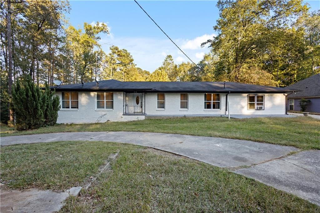 8 bedroom, 4 bathroom, 4,645 sq ft single family residence for sale at 154 Dollar Mill Road, Atlanta, GA 30331