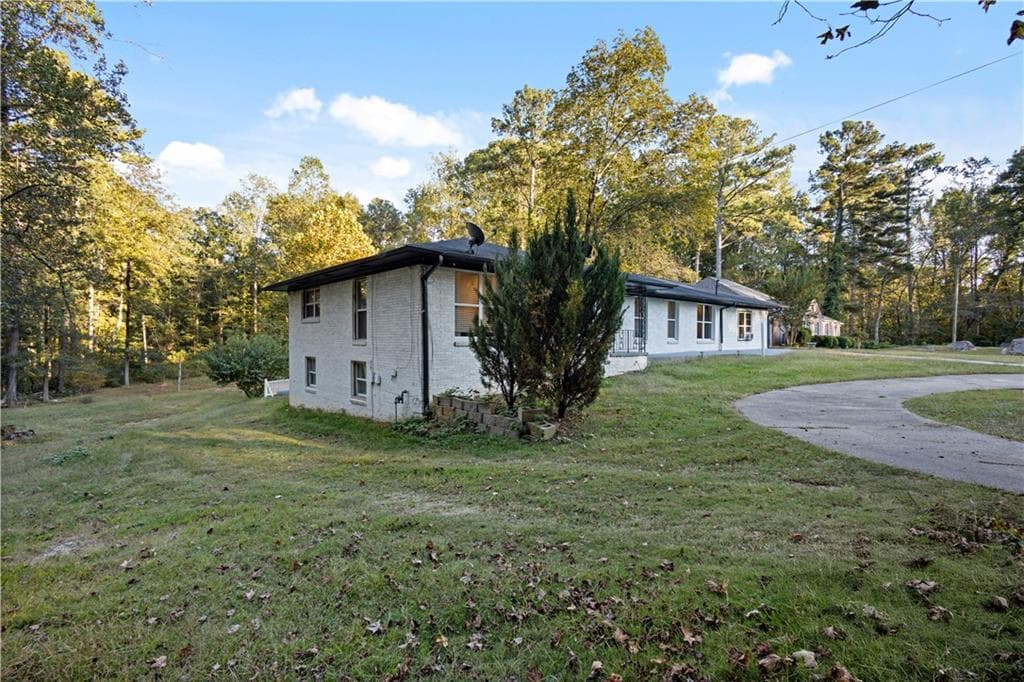 8 bedroom, 4 bathroom, 4,645 sq ft single family residence for sale at 154 Dollar Mill Road, Atlanta, GA 30331 — photo 2