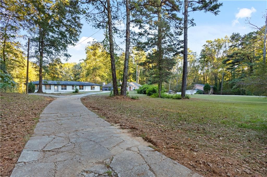 8 bedroom, 4 bathroom, 4,645 sq ft single family residence for sale at 154 Dollar Mill Road, Atlanta, GA 30331 — photo 3