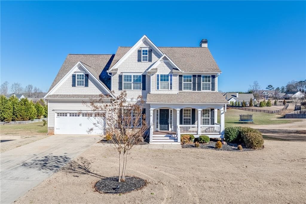 4 bedroom, 3 bathroom, 2,744 sq ft single family residence sold at 148 Downing Street, Hoschton, GA 30548