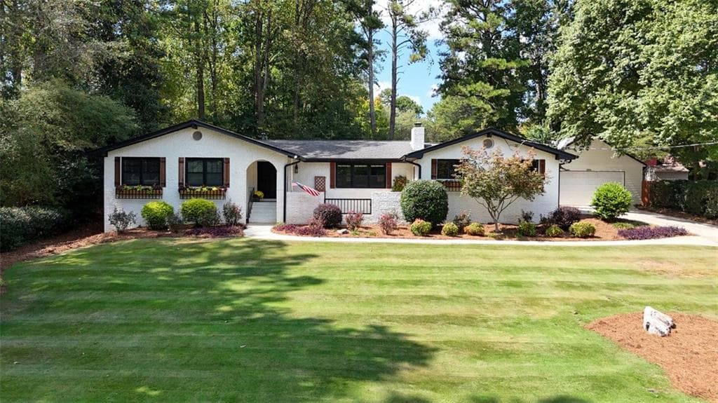 4 bedroom, 2 bathroom, 2,638 sq ft single family residence sold at 652 Windgrove Road, Marietta, GA 30067