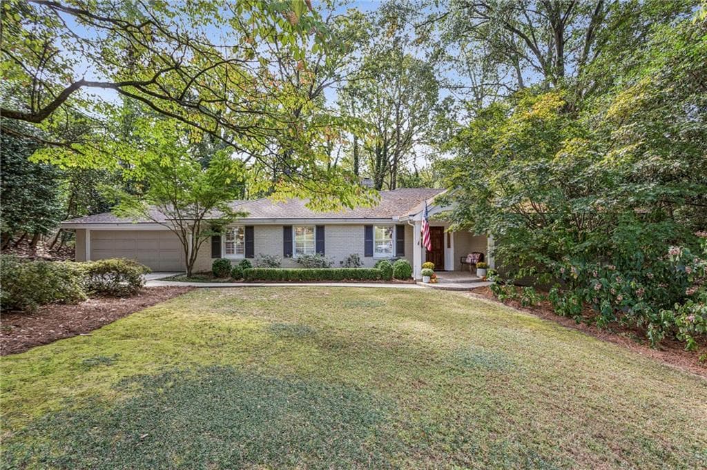 4 bedroom, 3 bathroom, 3,690 sq ft single family residence sold at 141 Laurel Forest Circle, Atlanta, GA 30342