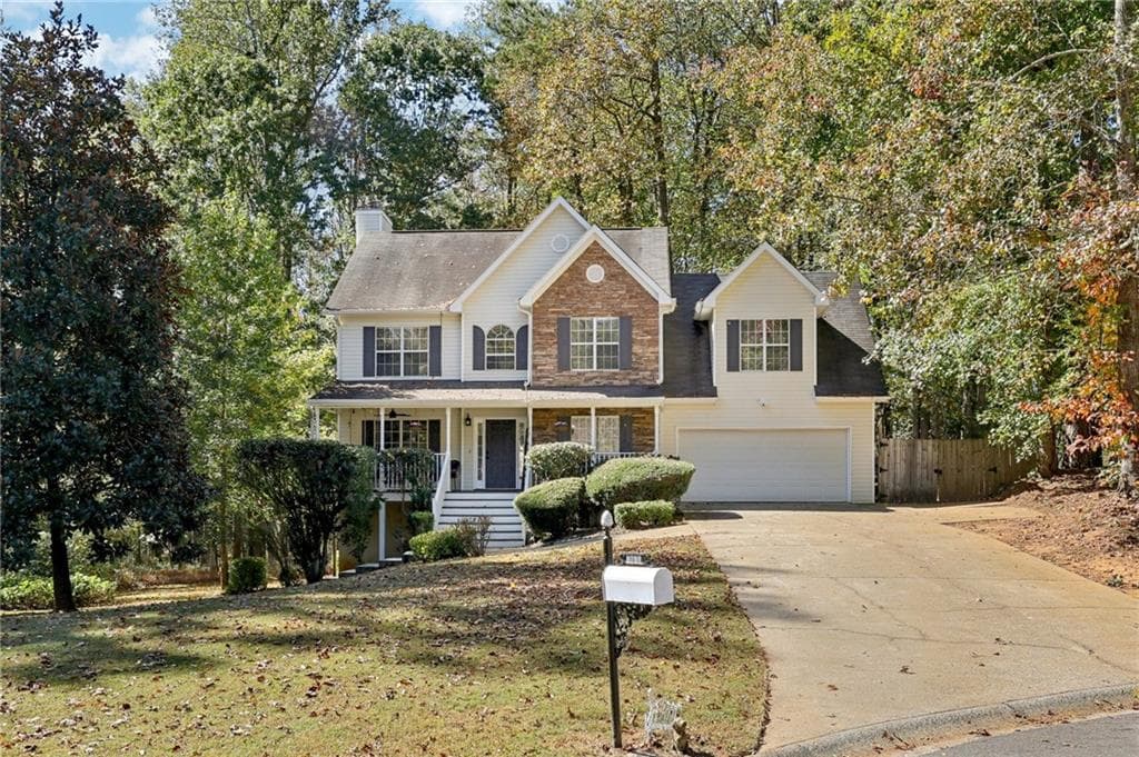 4 bedroom, 4 bathroom, 2,863 sq ft single family residence sold at 7670 Rose Lane, Cumming, GA 30040 — photo 1 of 1