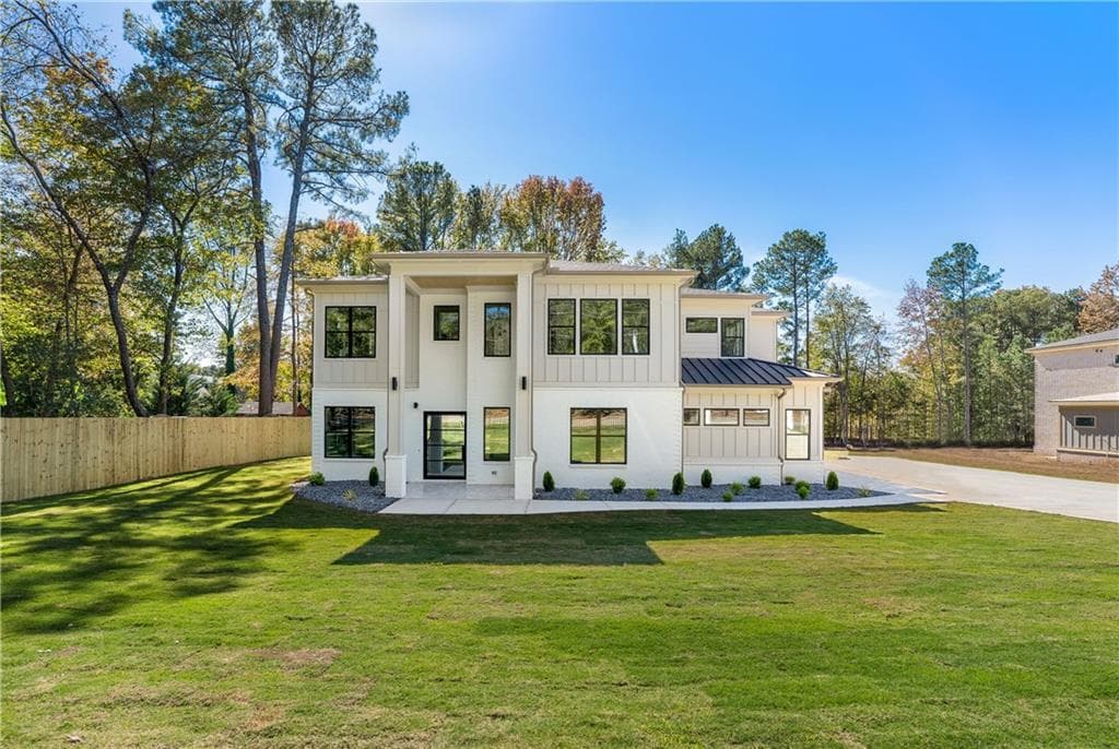 5 bedroom, 5 bathroom, 4,988 sq ft single family residence sold at 200 Simonton Road, Lawrenceville, GA 30046