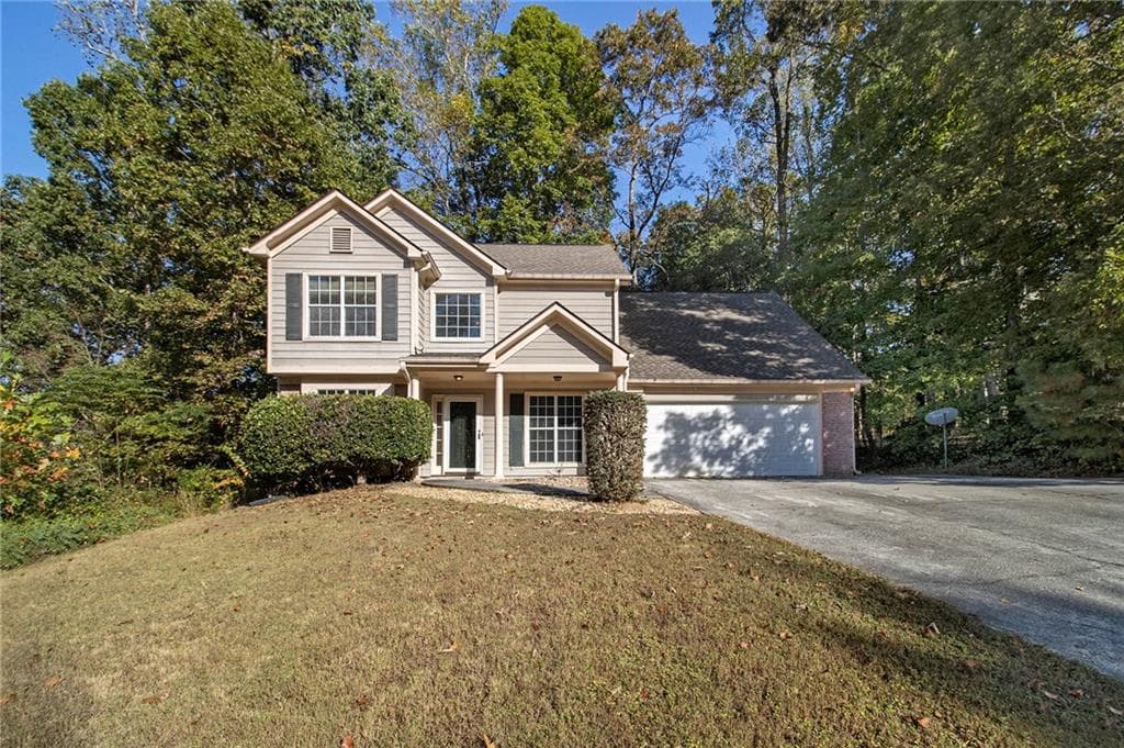 4 bedroom, 3 bathroom, 2,111 sq ft single family residence for sale at 4545 Forrest Bend Court, Snellville, GA 30039 — photo 2