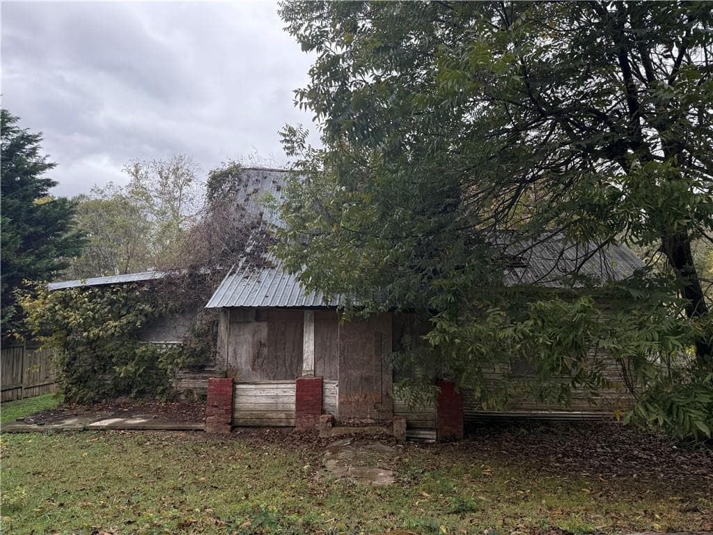 3 bedroom, 2 bathroom, 1,140 sq ft single family residence sold at 55/57 Shaw St, Kingston, GA 30145