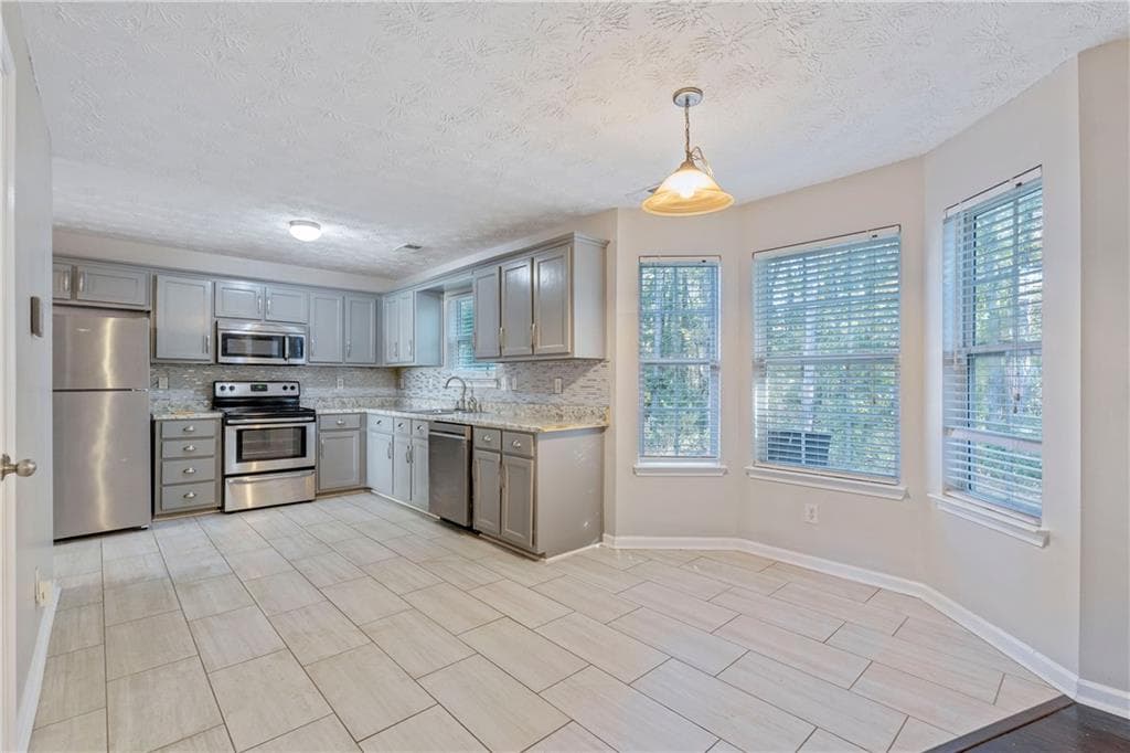 4 bedroom, 3 bathroom single family residence for rent at 9122 S Sterling Lakes, Covington, GA 30014 for $2,250 a month — photo 5