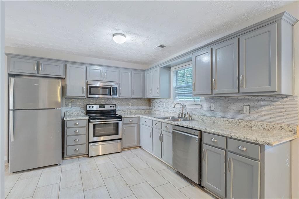4 bedroom, 3 bathroom single family residence for rent at 9122 S Sterling Lakes, Covington, GA 30014 for $2,250 a month — photo 6