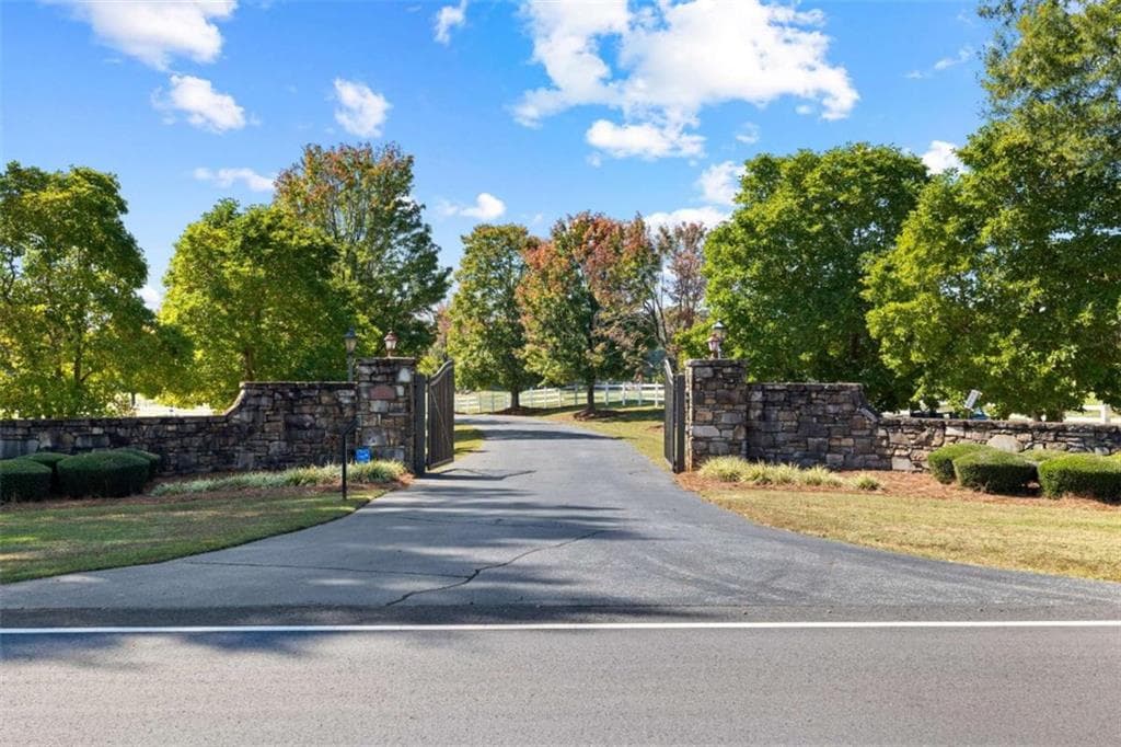 6 bedroom, 7 bathroom, 6,062 sq ft single family residence for sale at 5225 Chalybeate Springs Road, Woodland, GA 31836 — photo 2