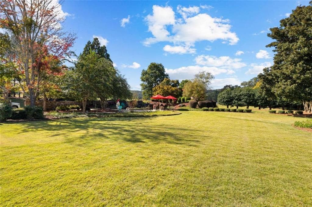 6 bedroom, 7 bathroom, 6,062 sq ft single family residence for sale at 5225 Chalybeate Springs Road, Woodland, GA 31836 — photo 8