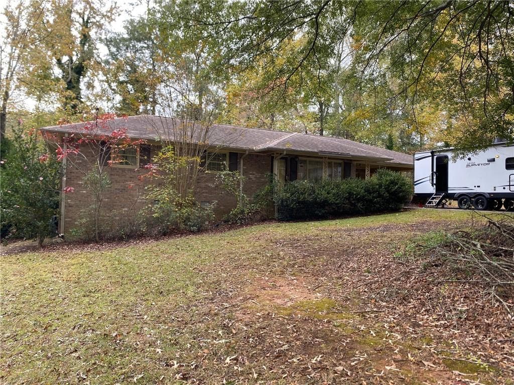 3 bedroom, 2 bathroom, 1,245 sq ft single family residence sold at 1697 Rustic Drive, Marietta, GA 30008