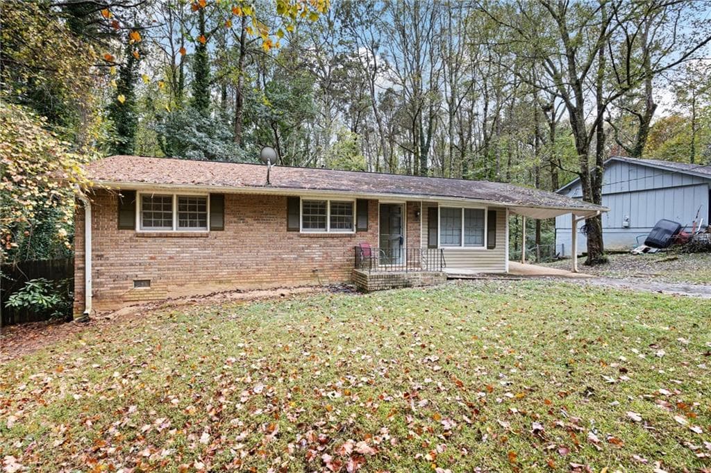 3 bedroom, 2 bathroom, 1,128 sq ft single family residence for sale at 971 Canyon Trail, Marietta, GA 30060 — photo 1 of 14