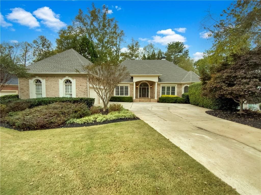 4 bedroom, 5 bathroom, 4,696 sq ft single family residence sold at 7125 Sheffield Place, Cumming, GA 30040