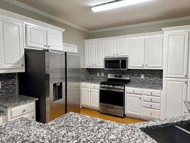 6 bedroom, 4 bathroom, 3,650 sq ft single family residence under contract at 1244 Hadaway Court, Lawrenceville, GA 30043 — photo 7