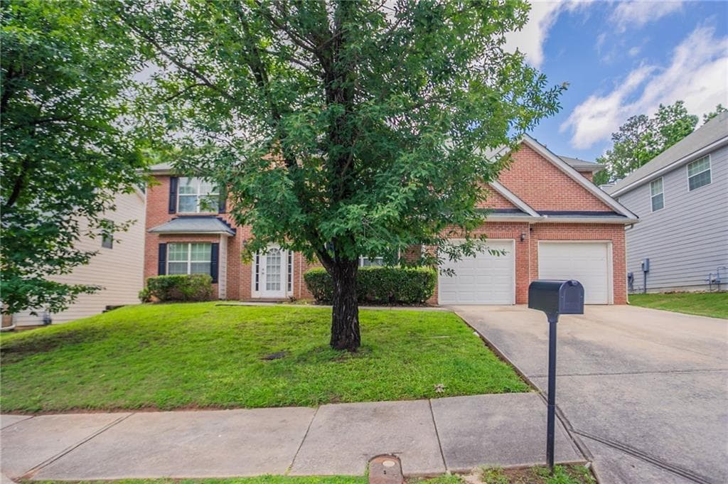 5 bedroom, 3 bathroom, 3,890 sq ft single family residence for sale at 7190 Cavender Drive, Atlanta, GA 30331 — photo 1 of 60