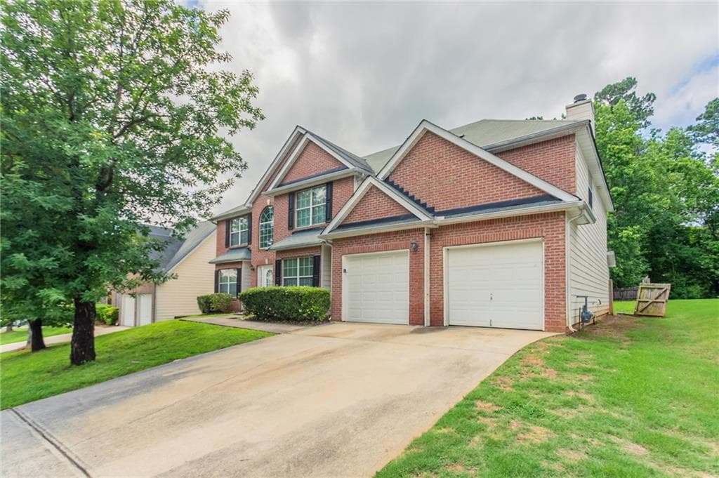 5 bedroom, 3 bathroom, 3,890 sq ft single family residence for sale at 7190 Cavender Drive, Atlanta, GA 30331 — photo 2