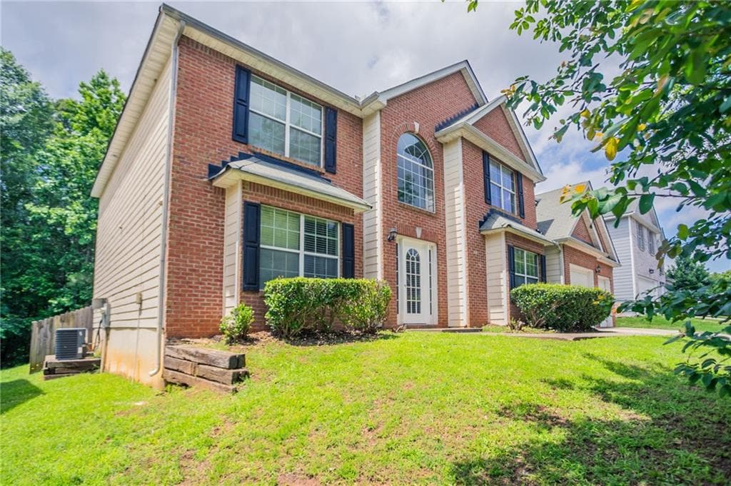 5 bedroom, 3 bathroom, 3,890 sq ft single family residence for sale at 7190 Cavender Drive, Atlanta, GA 30331 — photo 3