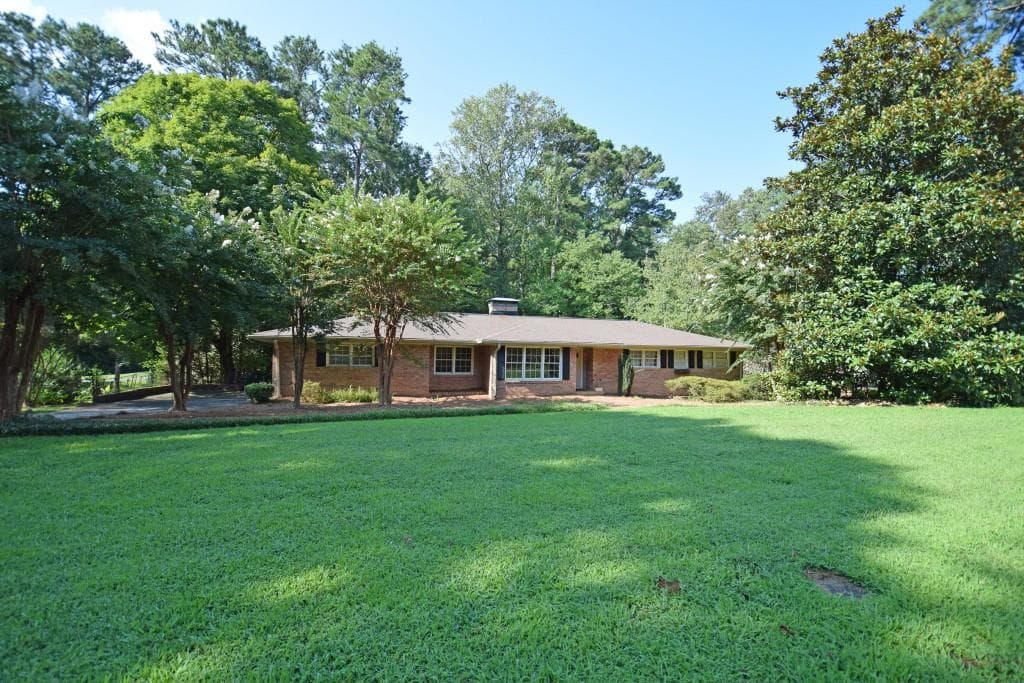 4 bedroom, 2 bathroom, 1,950 sq ft single family residence for sale at 4320 Brookview Drive, Atlanta, GA 30339 — photo 1 of 35