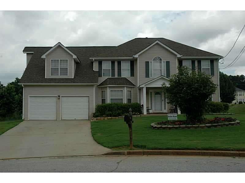 5 bedroom, 3 bathroom, 3,033 sq ft single family residence sold at 6236 Springwater Lane, Lithonia, GA 30058