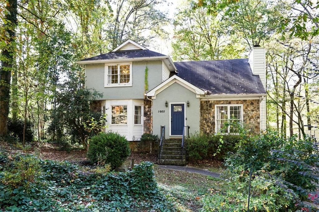 4 bedroom, 3 bathroom, 1,773 sq ft single family residence sold at 1665 RAMBLING WOODS Drive, Lawrenceville, GA 30043
